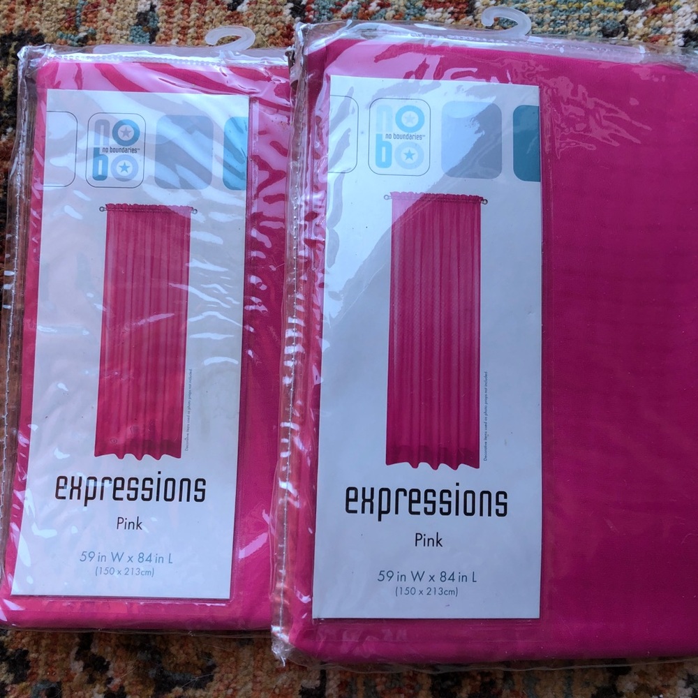 2 panels of Sheer Pink Curtains